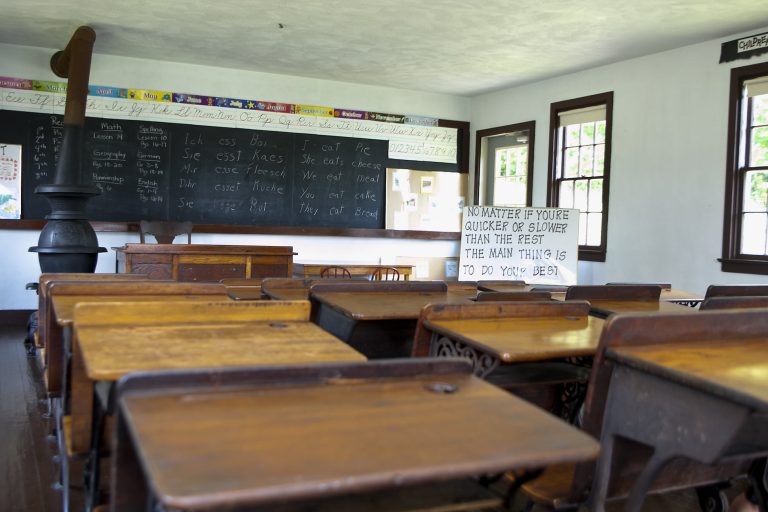Describe About The Amish Schoolhouse.